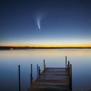 Comet Neowise at dawn on Little John Lake in the Northern Highland American Legion State Forest in Wisconsin.